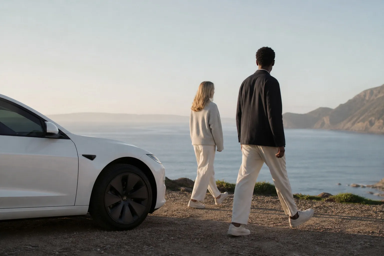 Couple in front of a cliff